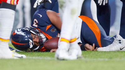 Broncos' Russell Wilson in concussion protocol after hard hit vs. Chiefs, putting Week 15 status in doubt